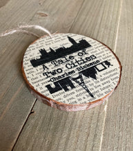 Load image into Gallery viewer, A Tale of Two Cities Wood Slice Ornament
